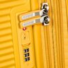 American Tourister Soundbox Spinner L Expandable Suitcase in Golden Yellow, 77 cm, 110 L, mit TSA-Zahlenschloss und Doppelrollen für komfortables Reisen.