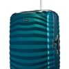 Samsonite Lite-Shock Spinner L Reisekoffer in Petrol Blau, 75 cm, leicht und robust, mit vier beweglichen Rollen und ausziehbarem Teleskopgriff für bequemes Reisen.