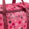 Sportliche Kindertasche in lebhaftem pink mit bunten Punkten, ideal für Sport und Reisen, ausgestattet mit robusten Trageriemen und reflektierenden Elementen.