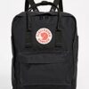 Fjällräven 23510 Kånken Rucksack in Schwarz mit modernem Design, ideal für Alltag und Outdoor-Aktivitäten. Detaillierte Ansicht mit Tragegurten und Reißverschlusstasche.